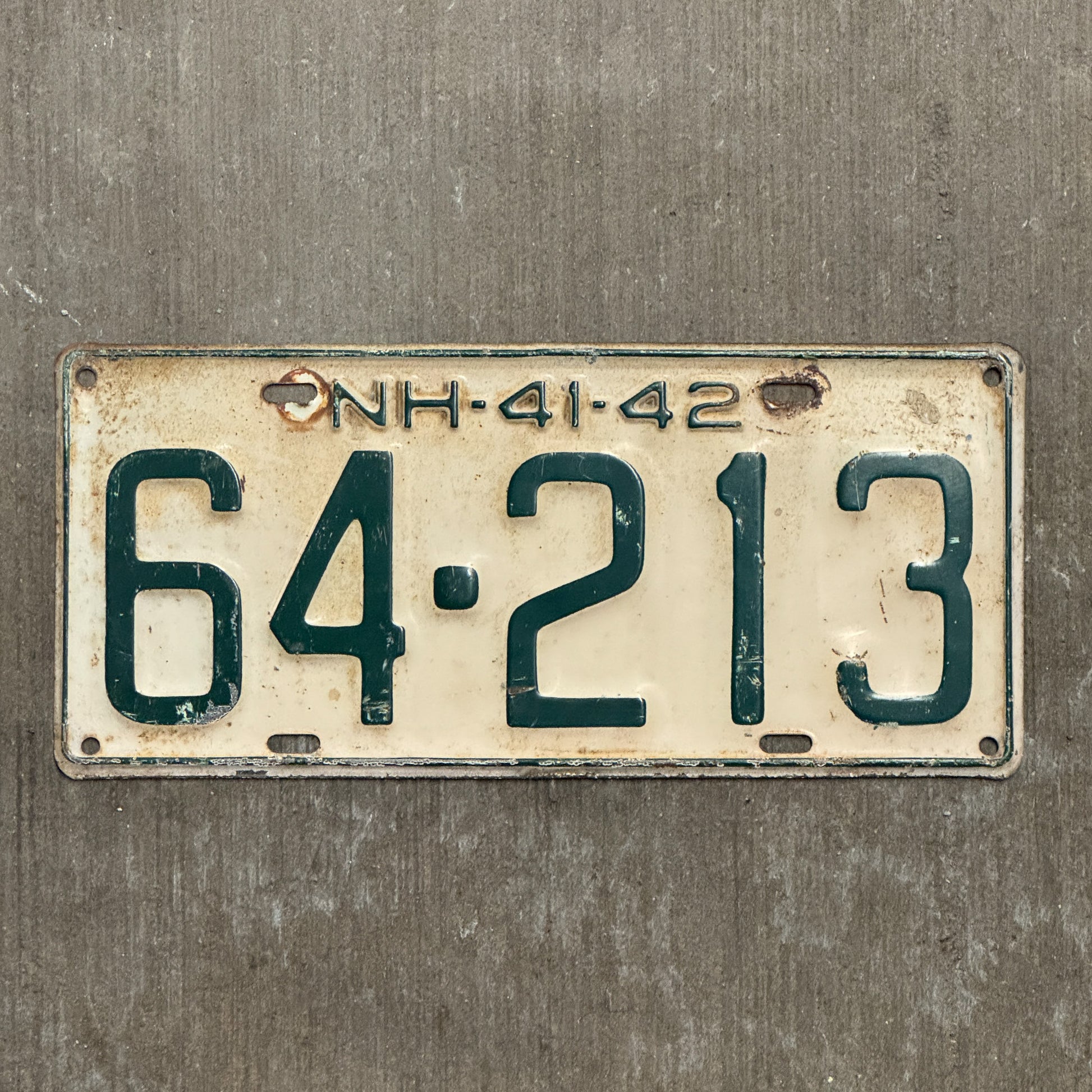Photo of a 1941 1942 New Hampshire License Plate Auto Tag Garage Decor Vintage 64 213 with original patina