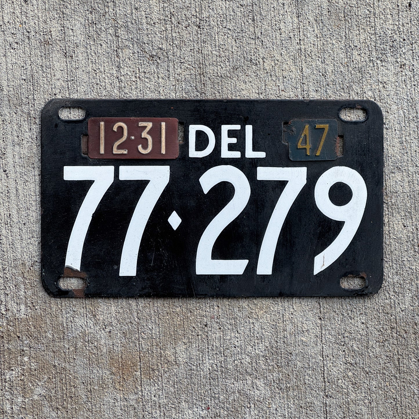 Photo of a 1941 1947 Delaware Porcelain License Plate Auto Tag Garage Decor Vintage 77 279 with original patina