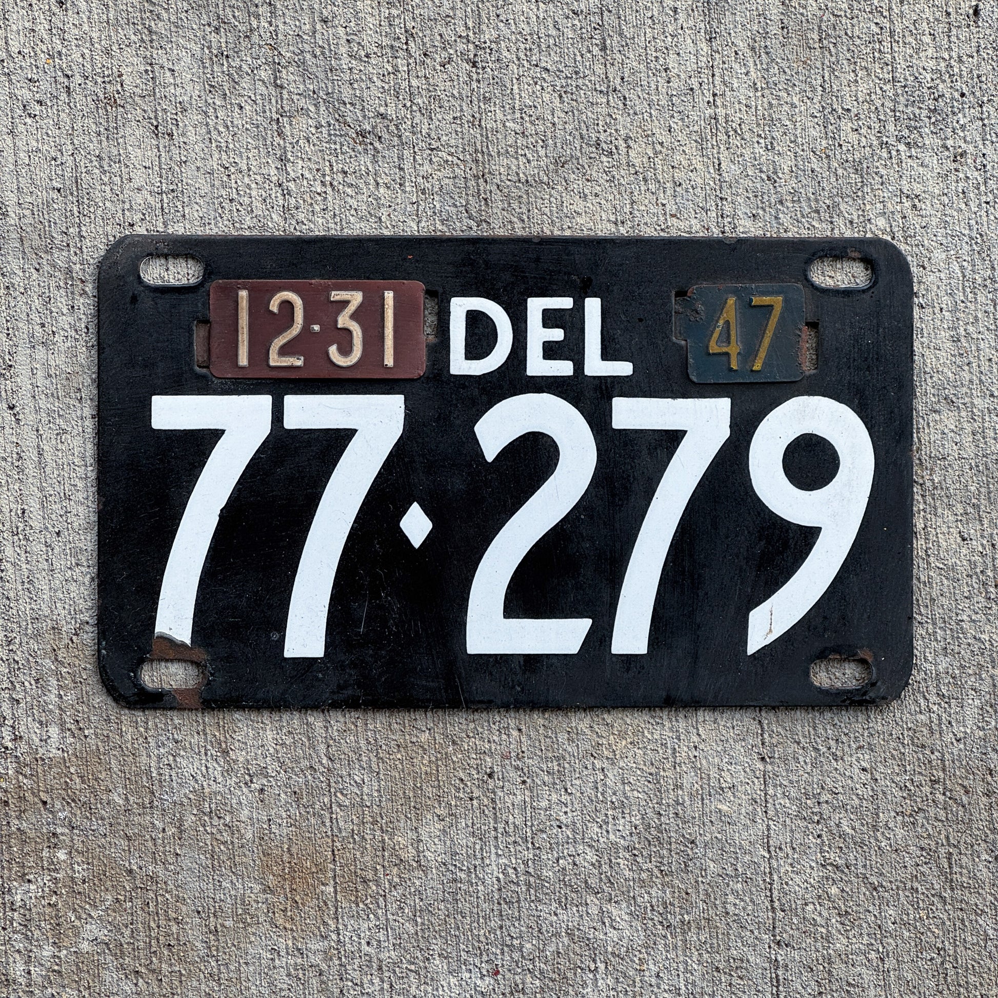 Photo of a 1941 1947 Delaware Porcelain License Plate Auto Tag Garage Decor Vintage 77 279 with original patina
