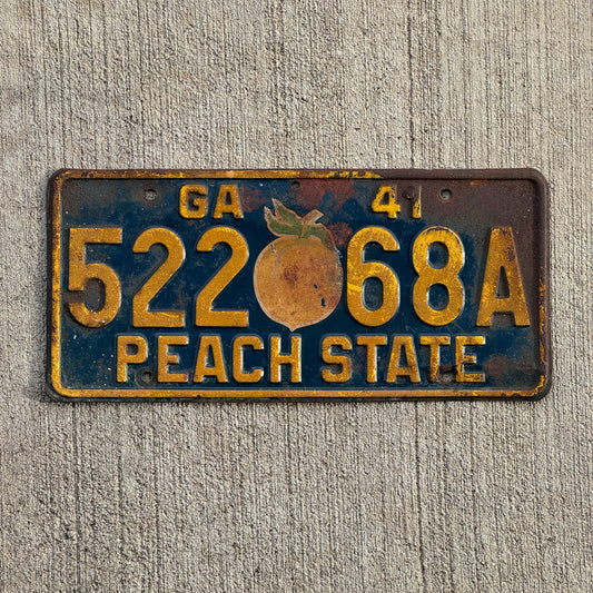 Photo of a 1941 Georgia License Plate Auto Tag Garage Decor Vintage Iconic Peach Graphic 522 68A with original patina