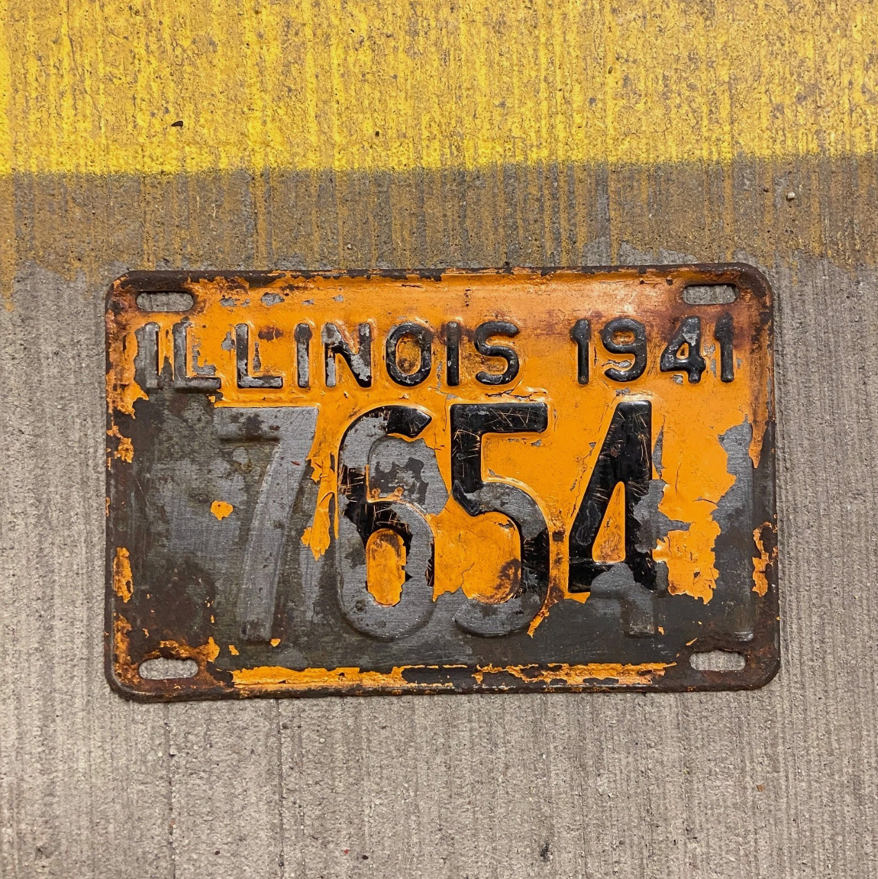 Photo of a 1941 Illinois License Plate Auto Tag Garage Decor Vintage 7654 with original patina