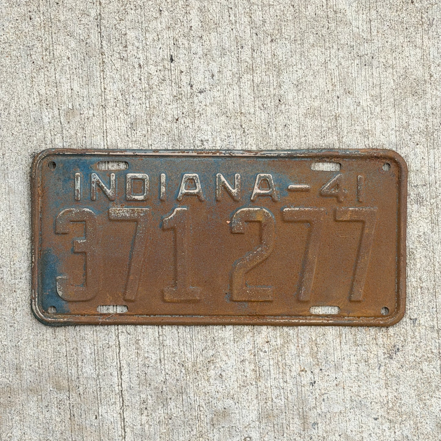 Photo of a 1941 Indiana License Plate Auto Tag Garage Decor Vintage 371 277 with original patina