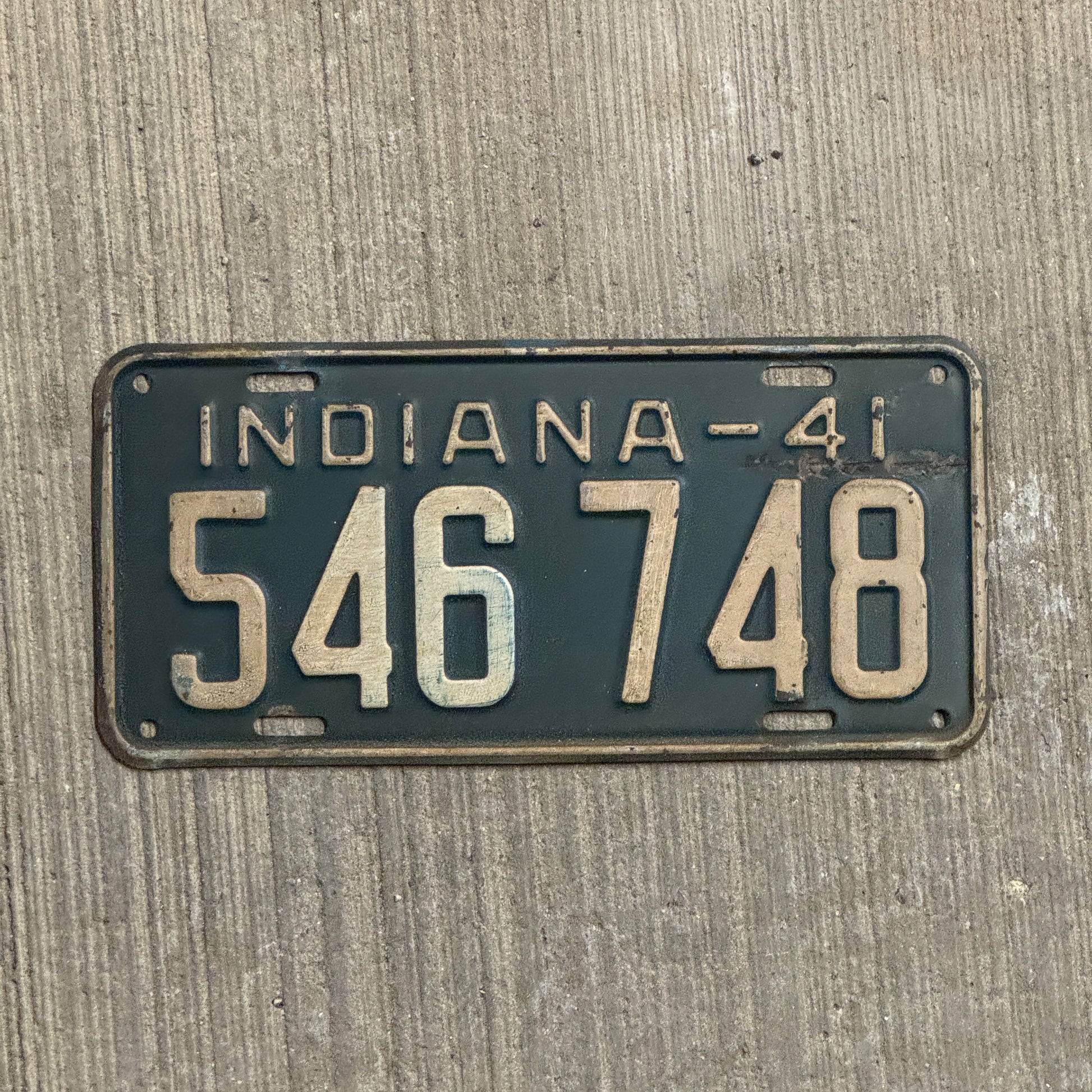 Photo of a 1941 Indiana License Plate Auto Tag Garage Decor Vintage 546 748 with original patina