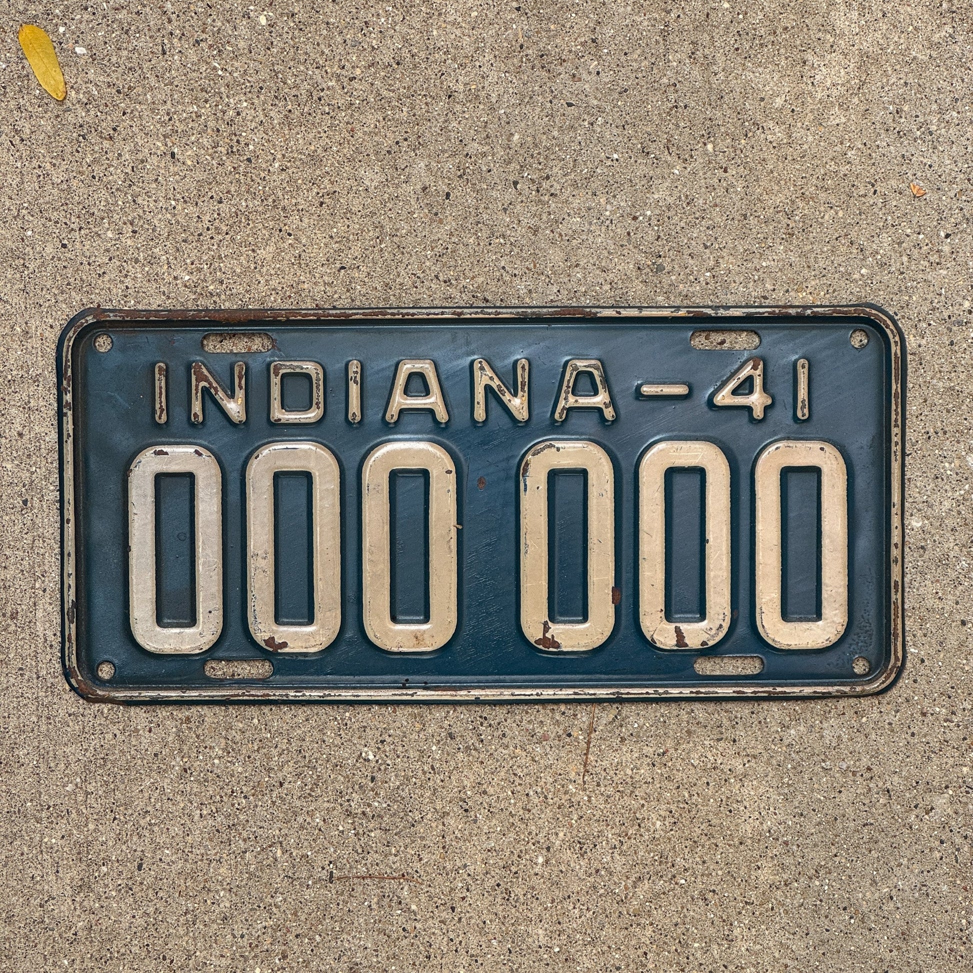 Photo of a 1941 Indiana Sample License Plate Auto Tag Garage Decor Vintage 000 000 with original patina
