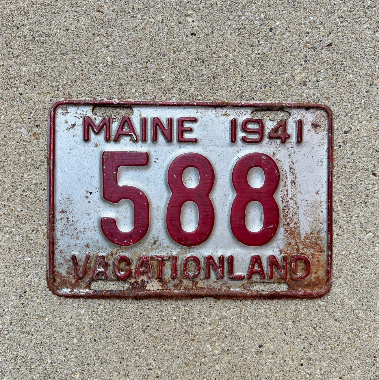 Photo of a 1941 Maine License Plate Auto Tag Garage Decor Vintage Low Number Three Digit 588 with original patina