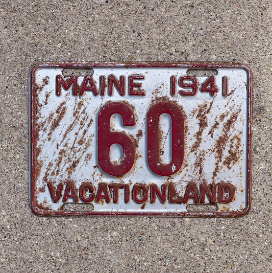Photo of a 1941 Maine License Plate Auto Tag Garage Decor Vintage Low Number Two Digit 60 with original patina