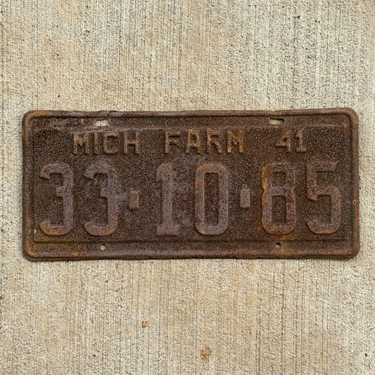Photo of a 1941 Michigan Farm License Plate Auto Tag Garage Decor Vintage 33 10 85 with original patina