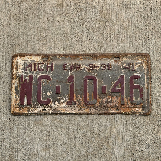 Photo of a 1941 Michigan License Plate Auto Tag Garage Decor Vintage Half Year WC 10 46 with original patina