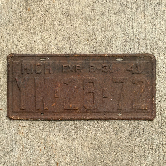 Photo of a 1941 Michigan License Plate Auto Tag Garage Decor Vintage Half Year YW 28 72 with original patina
