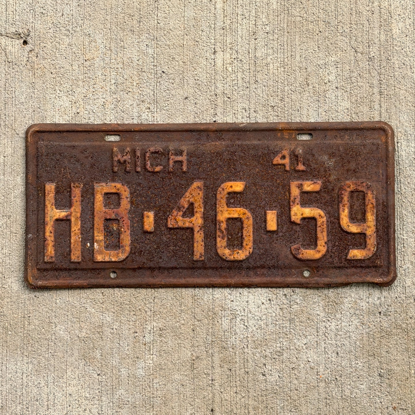 Photo of a 1941 Michigan License Plate Auto Tag Garage Decor Vintage HB 46 59 with original patina