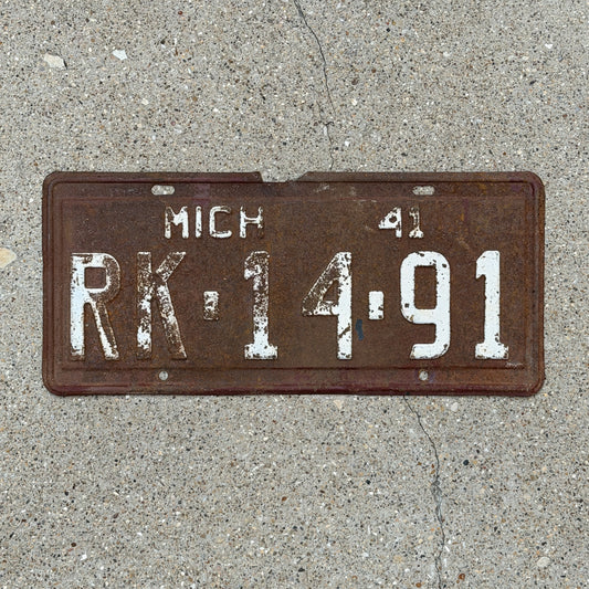 Photo of a 1941 Michigan License Plate Auto Tag Garage Decor Vintage RK 14 91 with original patina