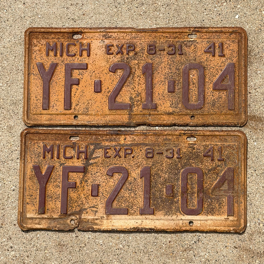 Photo of a 1941 Michigan License Plate Pair Auto Tag Garage Decor Vintage Half Year YF 21 04 with original patina