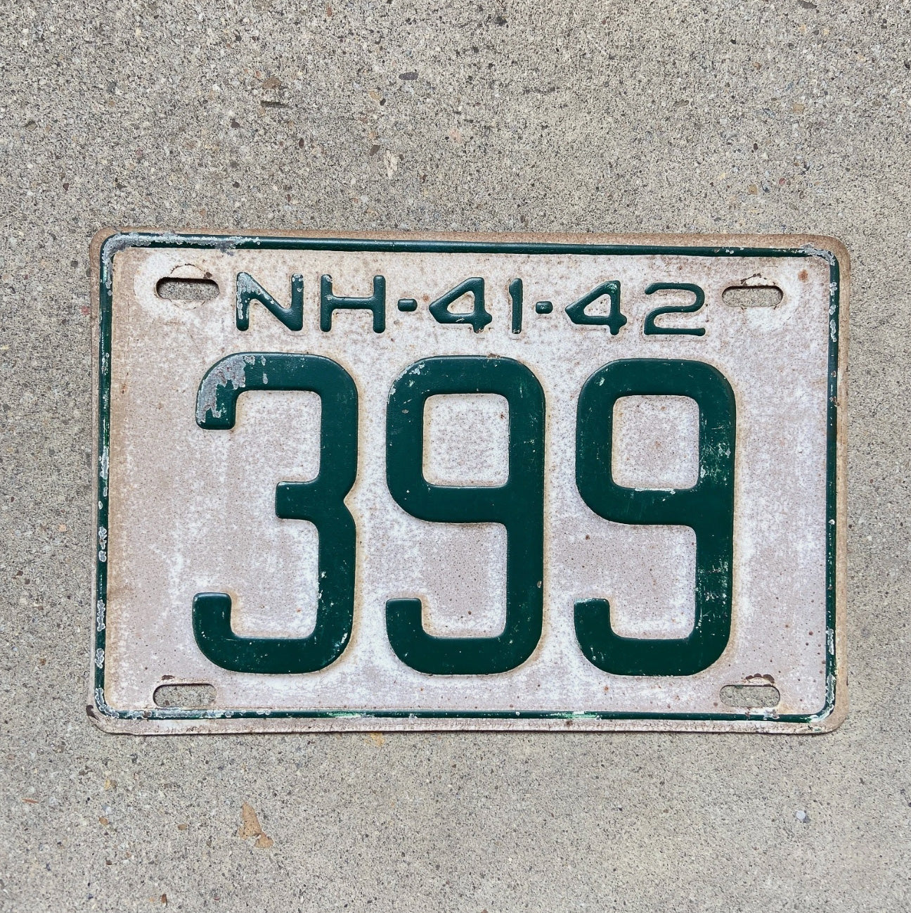 Photo of a 1941 New Hampshire License Plate Auto Tag Garage Decor Vintage Low Number Three Digit 399 with original patina