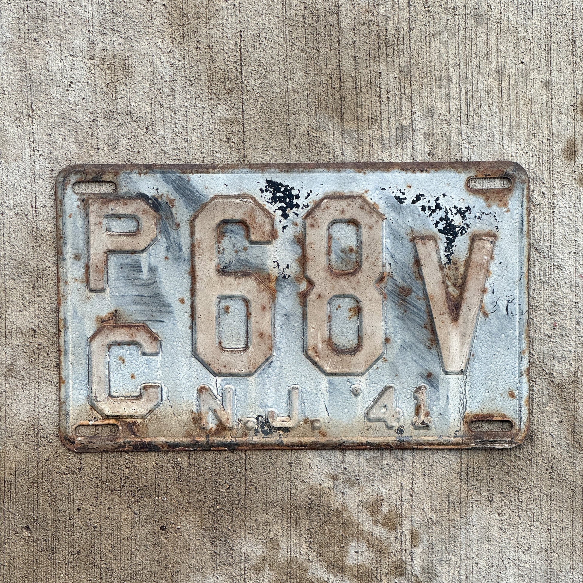 Photo of a 1941 New Jersey License Plate Auto Tag 2 Vintage Garage PC 68 V with original patina