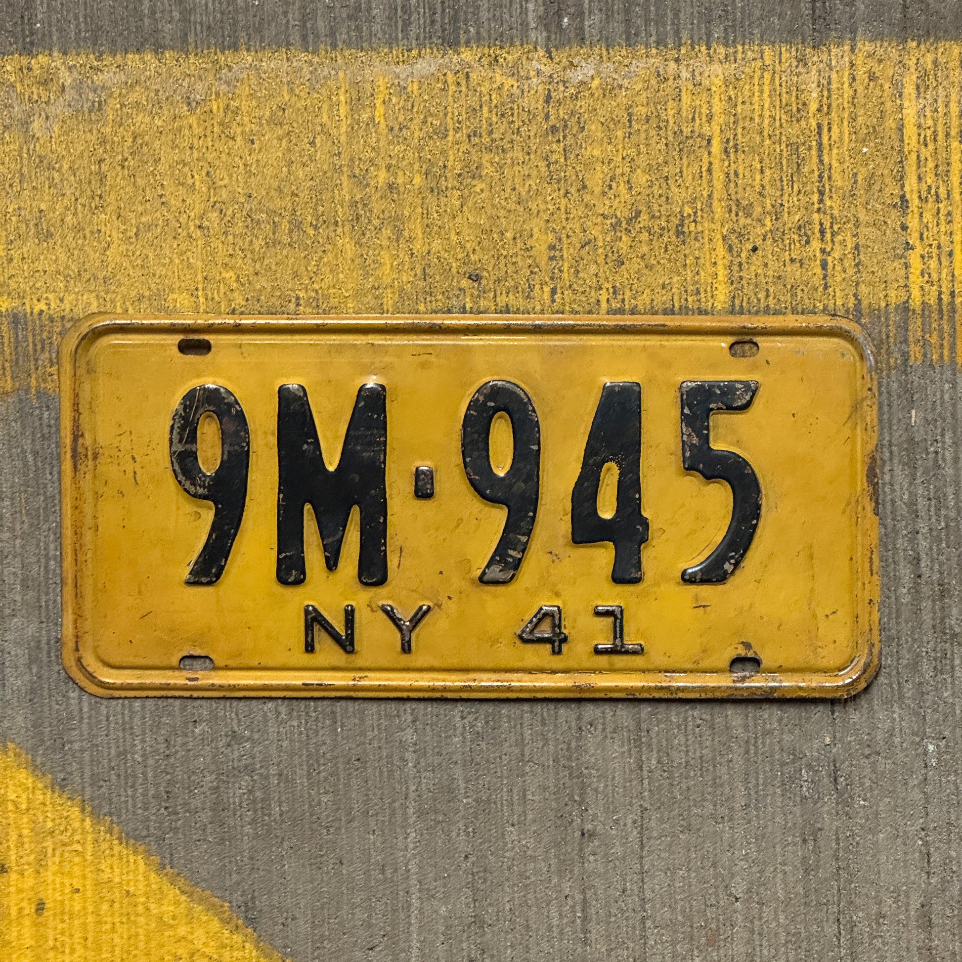 Photo of a 1941 New York License Plate Auto Tag Garage Decor Vintage 9M 945 with original patina