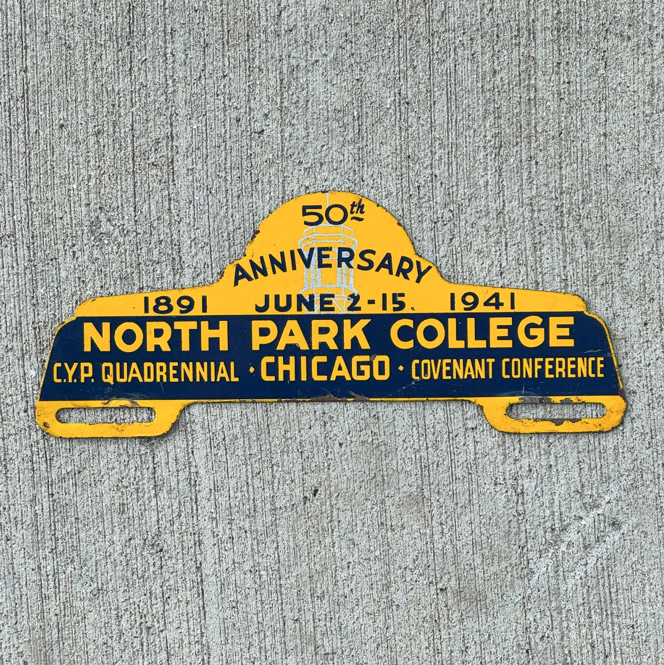 Photo of a 1941 North Park College Chicago Illinois License Plate Topper Auto Tag Garage Decor Vintage University Auto with original patina