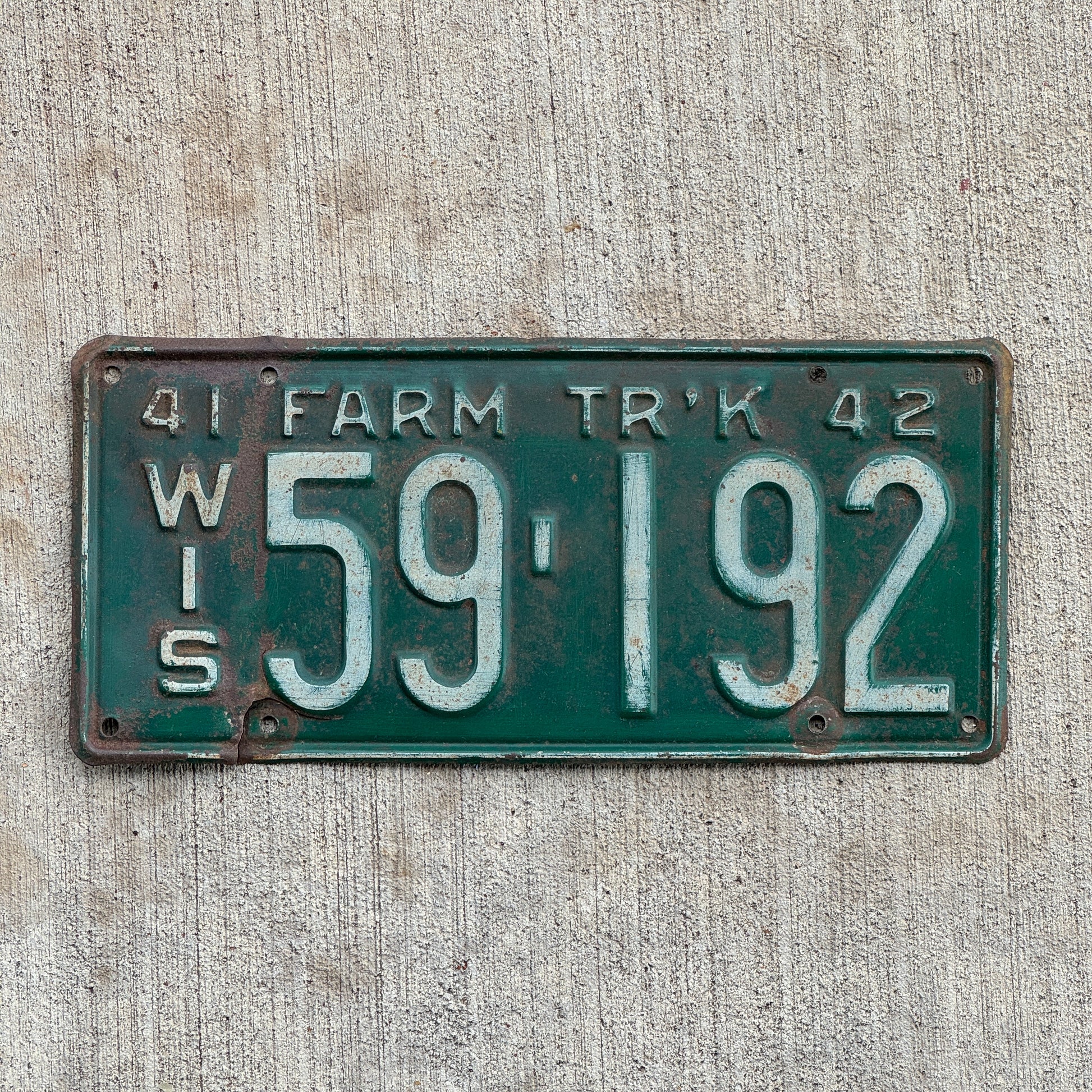 Photo of a 1941 Wisconsin Farm Truck License Plate Auto Tag Garage Decor Vintage 59 192 with original patina
