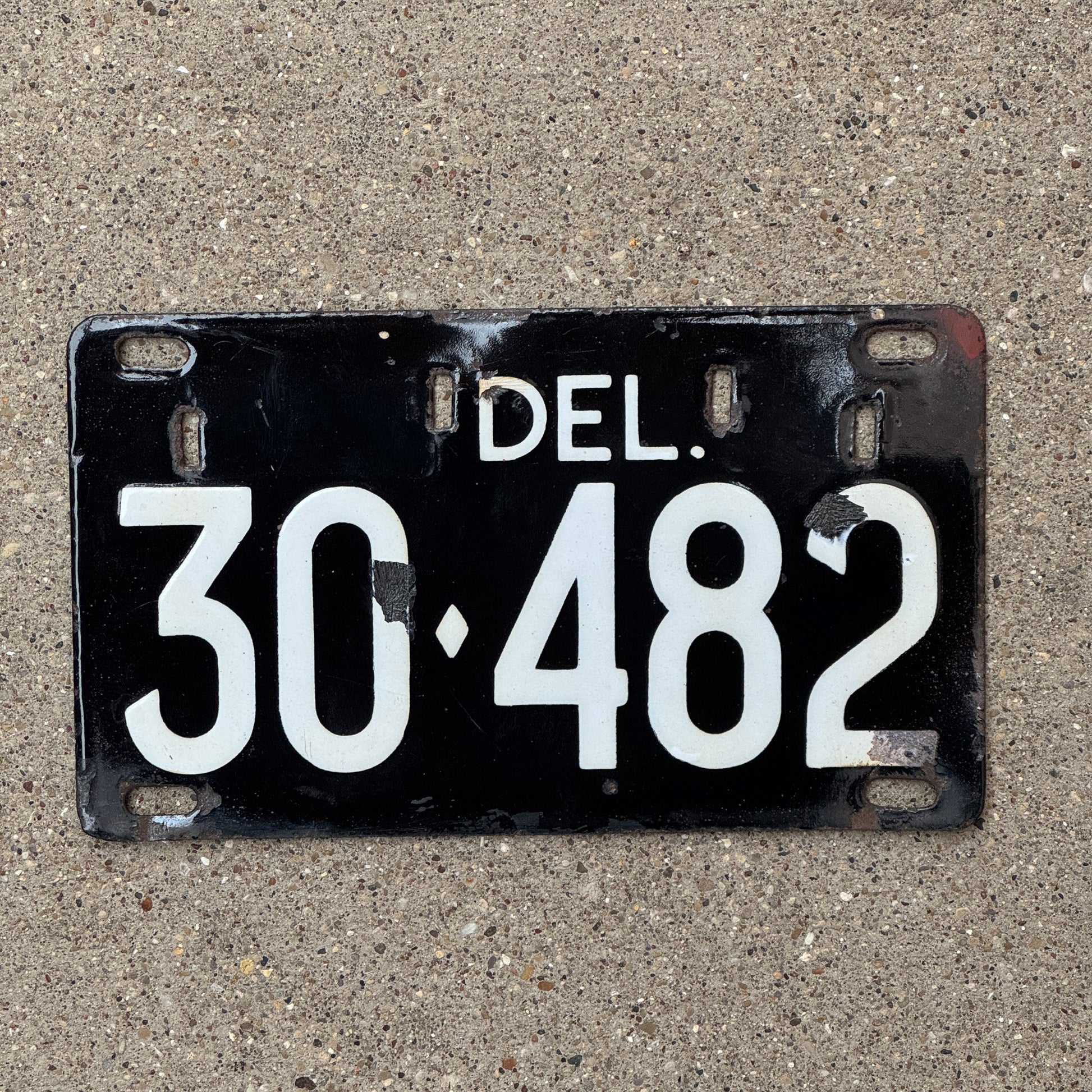 Photo of a 1942 Delaware Porcelain License Plate Auto Tag Garage Decor Vintage 30 482 with original patina