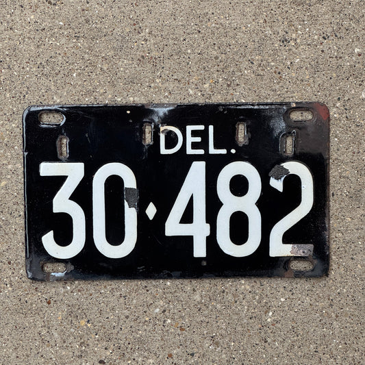 Photo of a 1942 Delaware Porcelain License Plate Auto Tag Garage Decor Vintage 30 482 with original patina