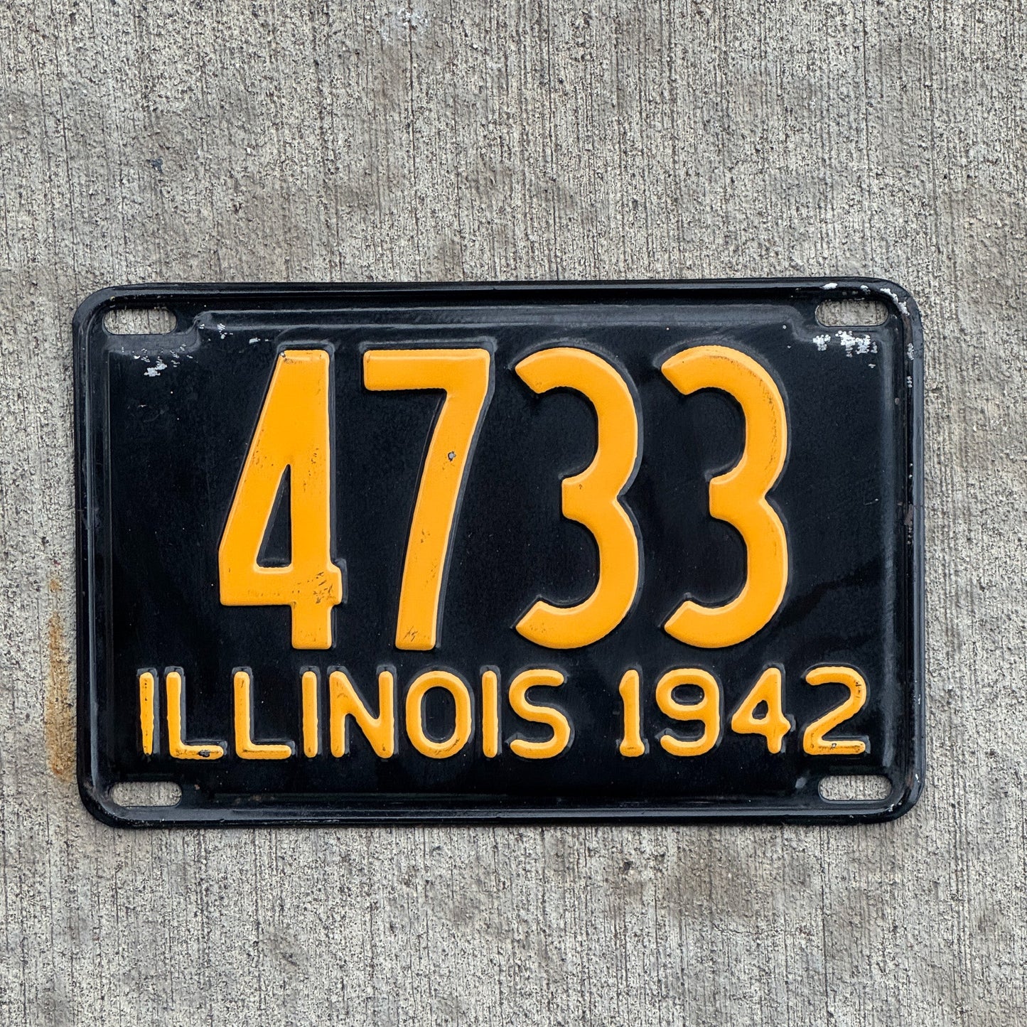 Photo of a 1942 Illinois License Plate Auto Tag Garage Decor Vintage Low Number Four Digit 4733 with original patina