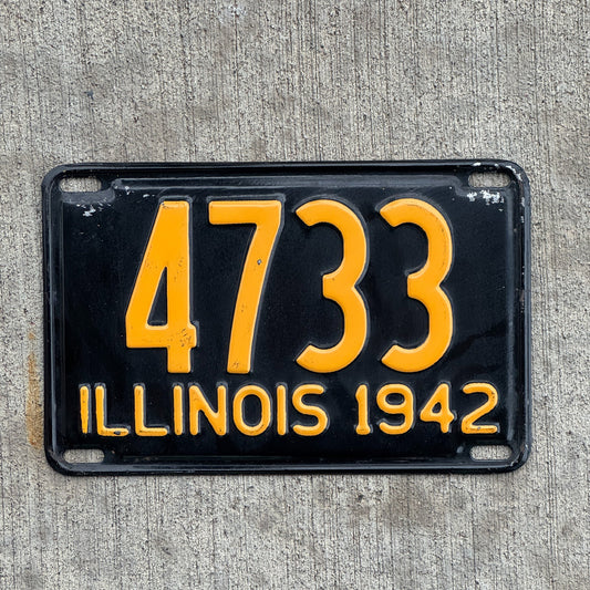 Photo of a 1942 Illinois License Plate Auto Tag Garage Decor Vintage Low Number Four Digit 4733 with original patina