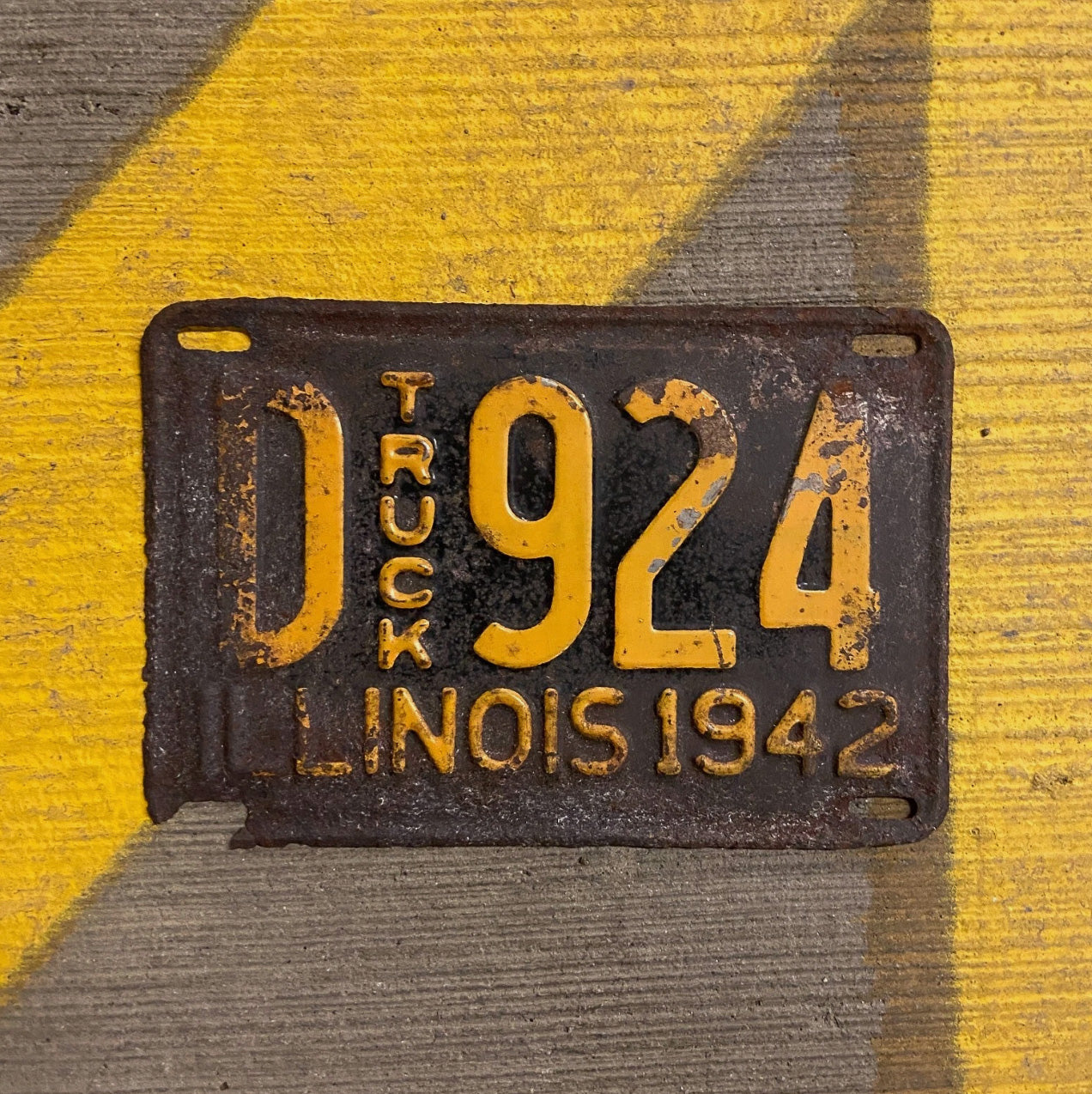 Photo of a 1942 Illinois Truck License Plate Auto Tag Garage Decor Vintage D 924 with original patina