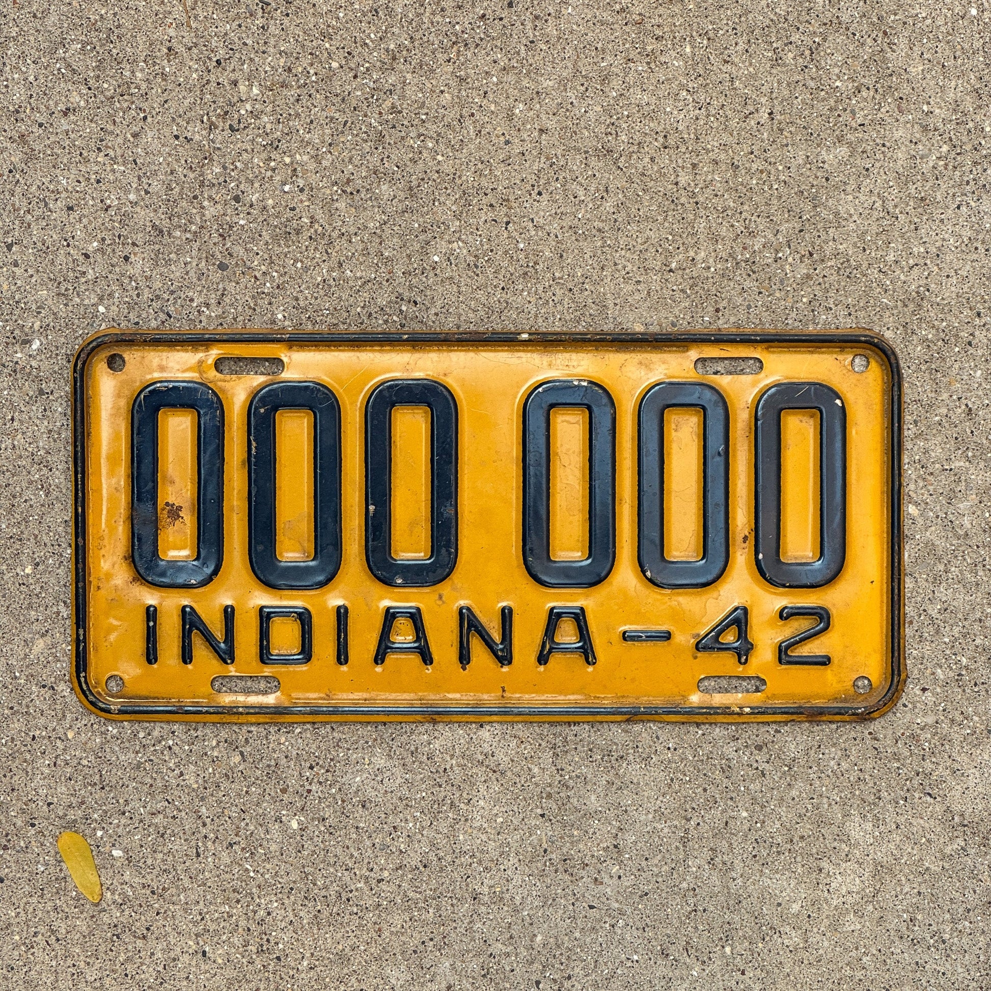 Photo of a 1942 Indiana Sample License Plate Auto Tag Garage Decor Vintage 000 000 with original patina