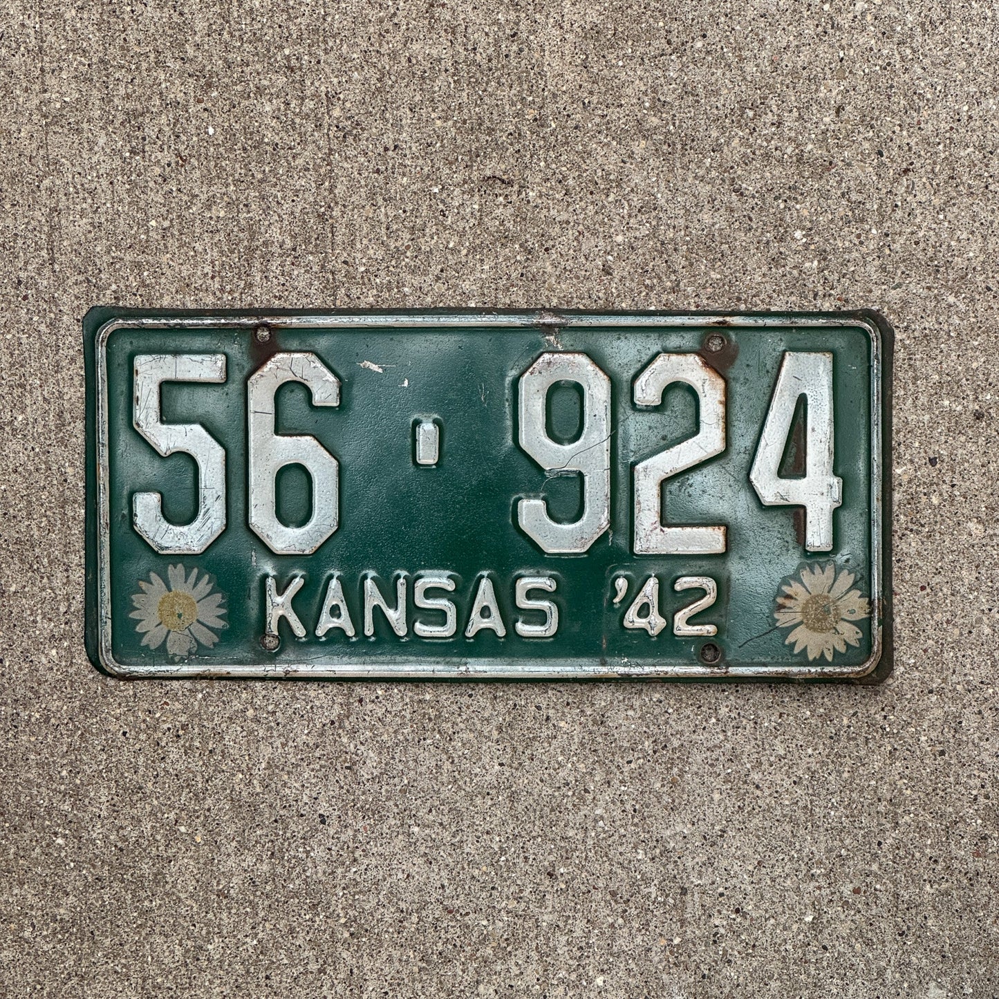 Photo of a 1942 Kansas License Plate Auto Tag Garage Decor Vintage Iconic Sunflowers 56 924 with original patina