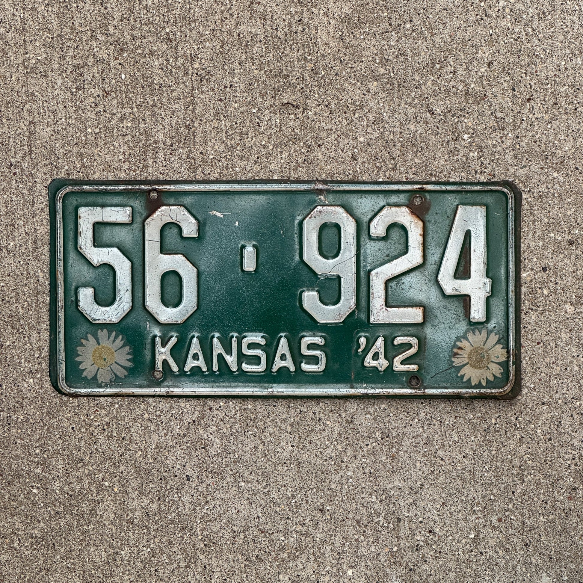 Photo of a 1942 Kansas License Plate Auto Tag Garage Decor Vintage Iconic Sunflowers 56 924 with original patina