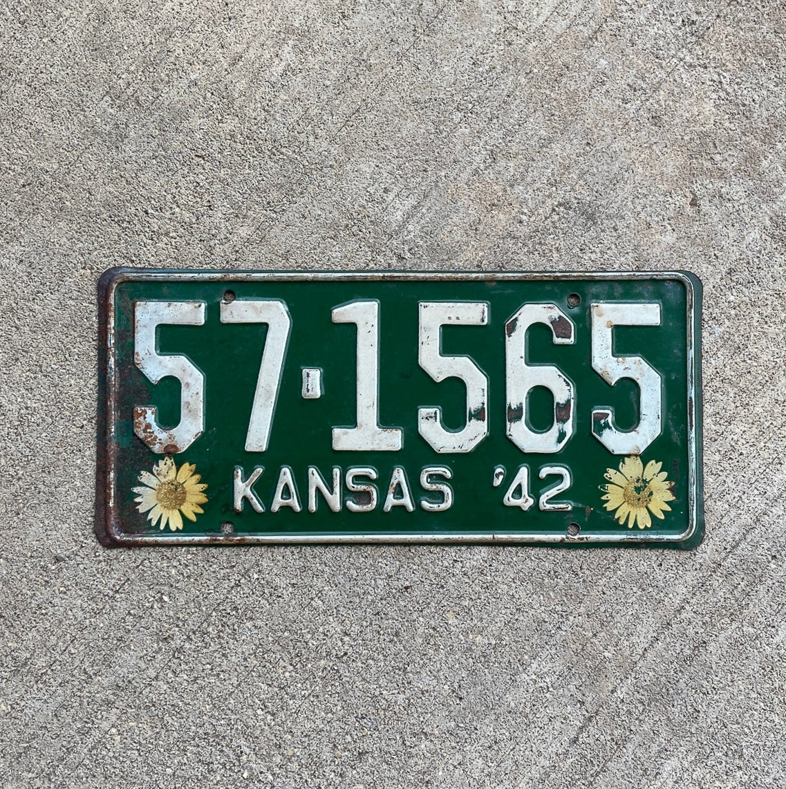 Photo of a 1942 Kansas License Plate Auto Tag Garage Decor Vintage Iconic Sunflowers 57 1565 with original patina