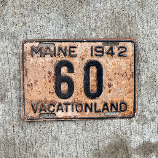 Photo of a 1942 Maine License Plate Auto Tag 1 Vintage Garage Low Number Two Digit 60 with original patina