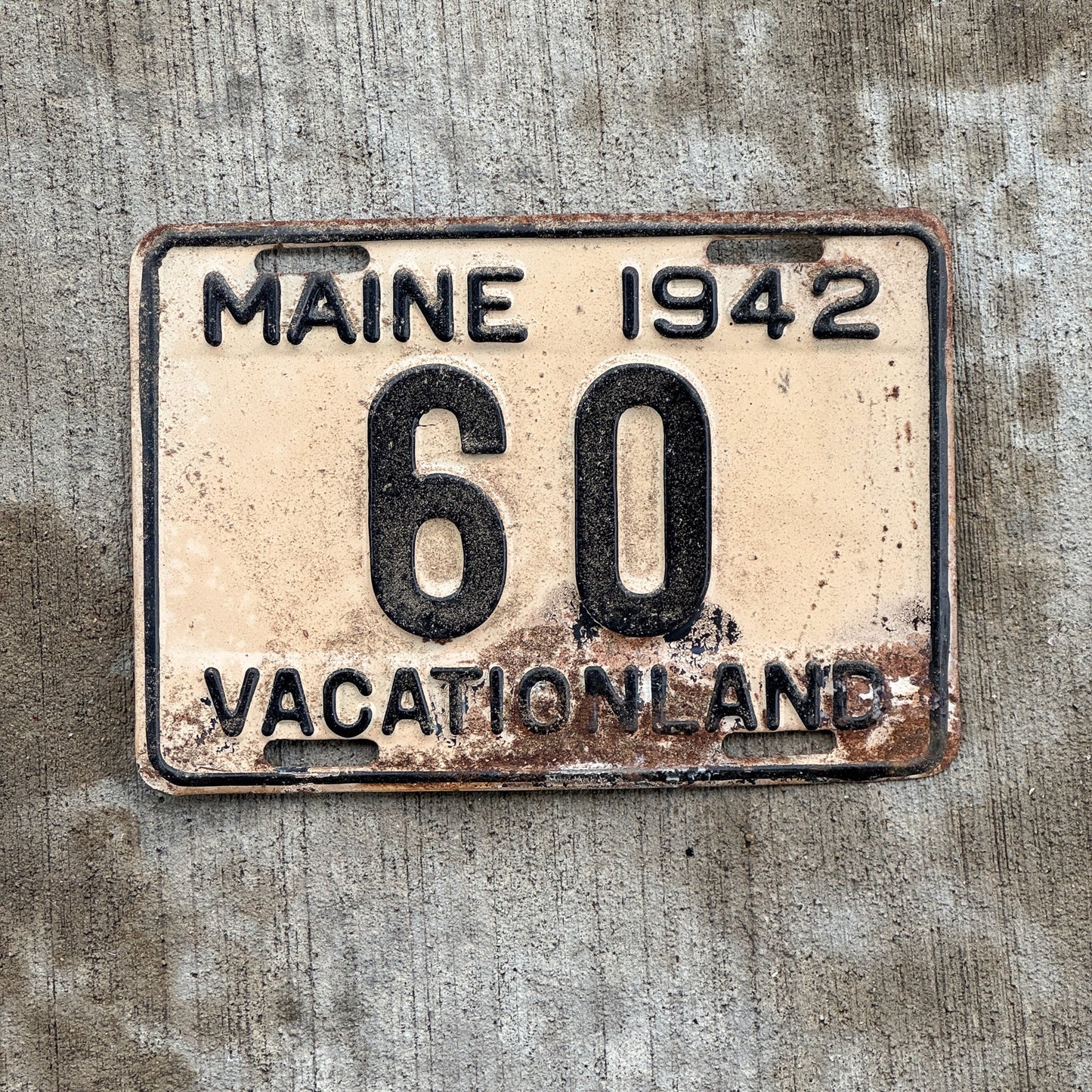Photo of a 1942 Maine License Plate Auto Tag 2 Vintage Garage Low Number Two Digit 60 with original patina
