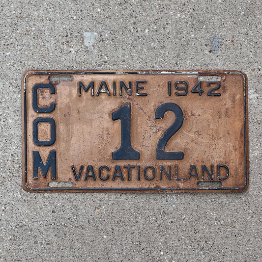 Photo of a 1942 Maine Truck License Plate Auto Tag 2 Vintage Garage Low Number Two Digit 12 with original patina