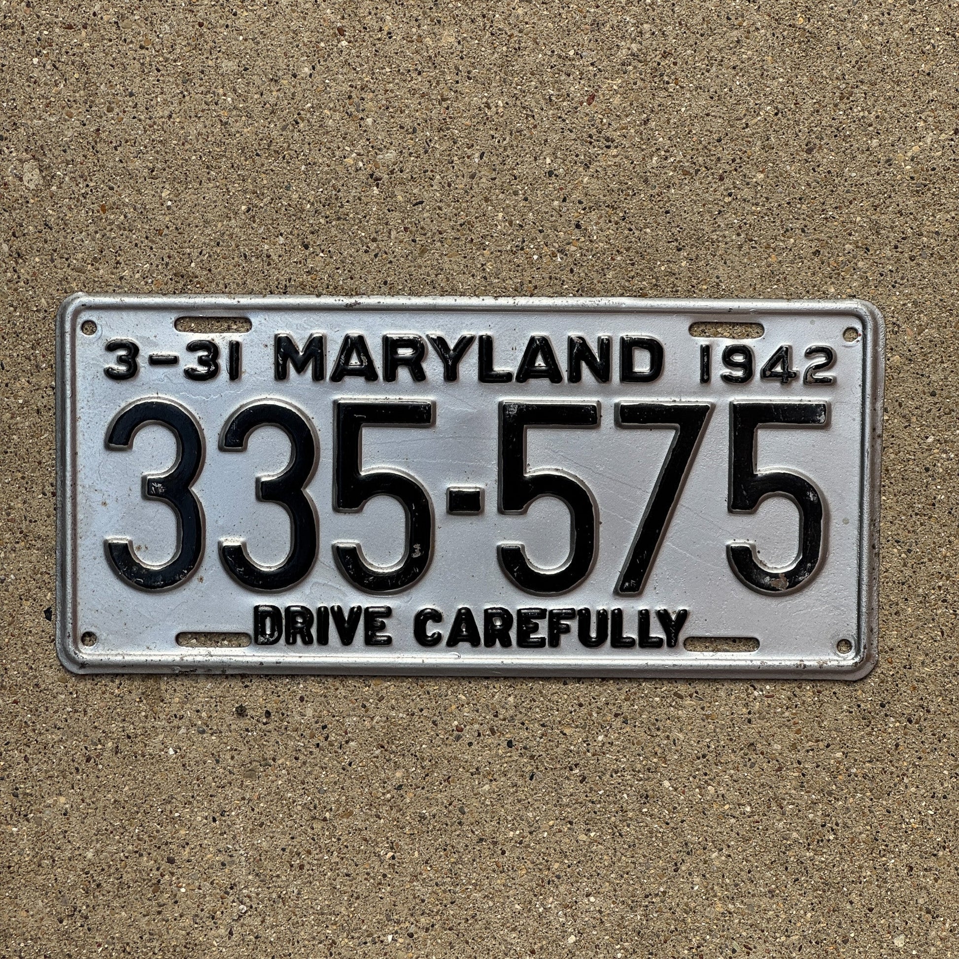 Photo of a 1942 Maryland License Plate Auto Tag Garage Decor Vintage 335 575