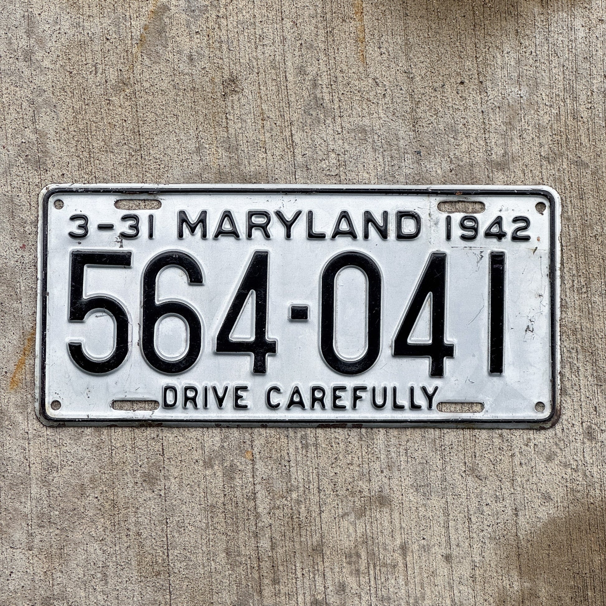 Photo of a 1942 Maryland License Plate Auto Tag Garage Decor Vintage High Quality 564 041 with original patina