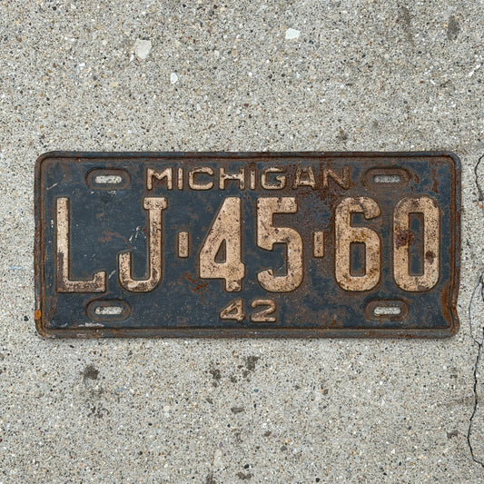 Photo of a 1942 Michigan License Plate Auto Tag Garage Decor Vintage LJ 45 60 with original patina