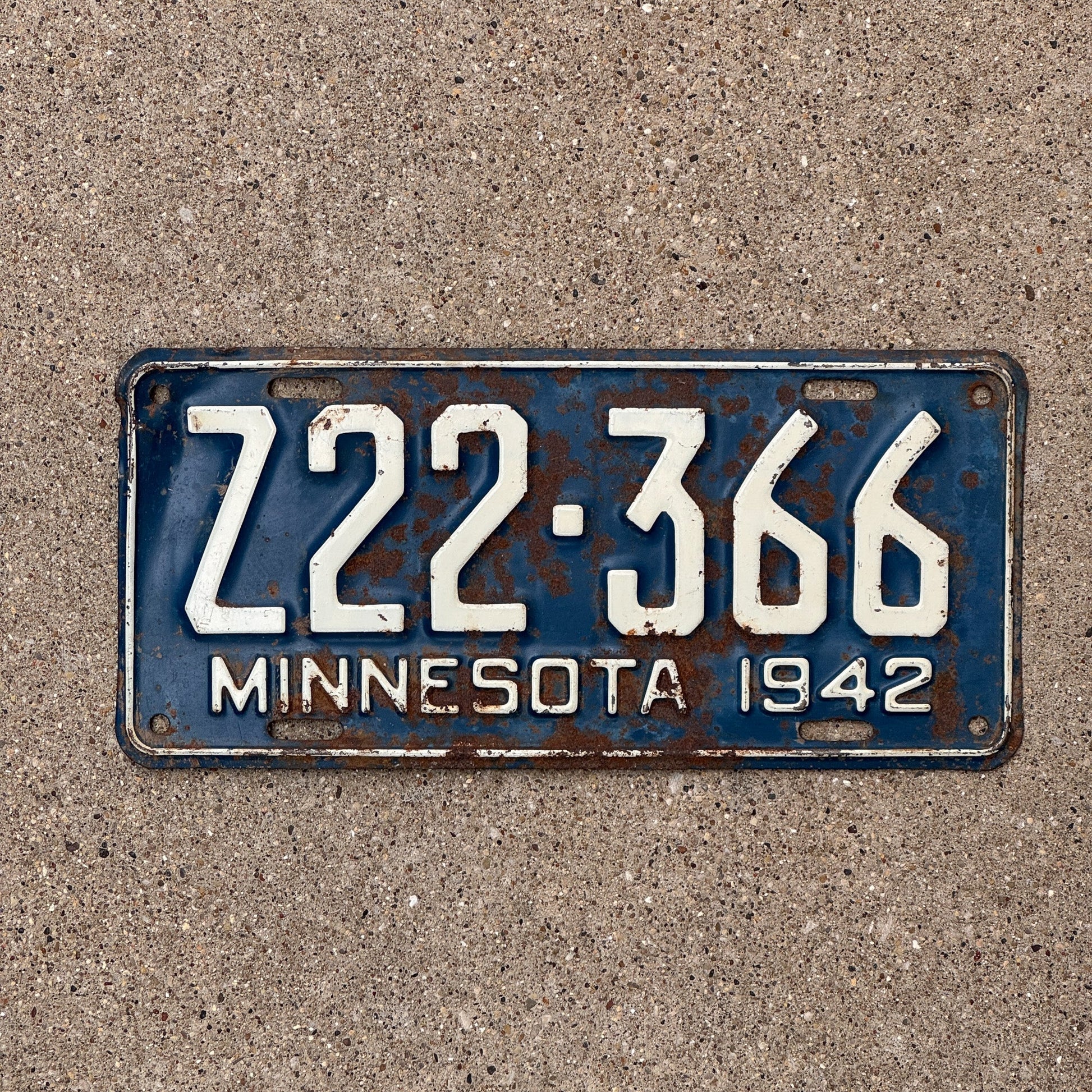 Photo of a 1942 Minnesota TRAILER License Plate Auto Tag Garage Decor Vintage Blue White Z 22366