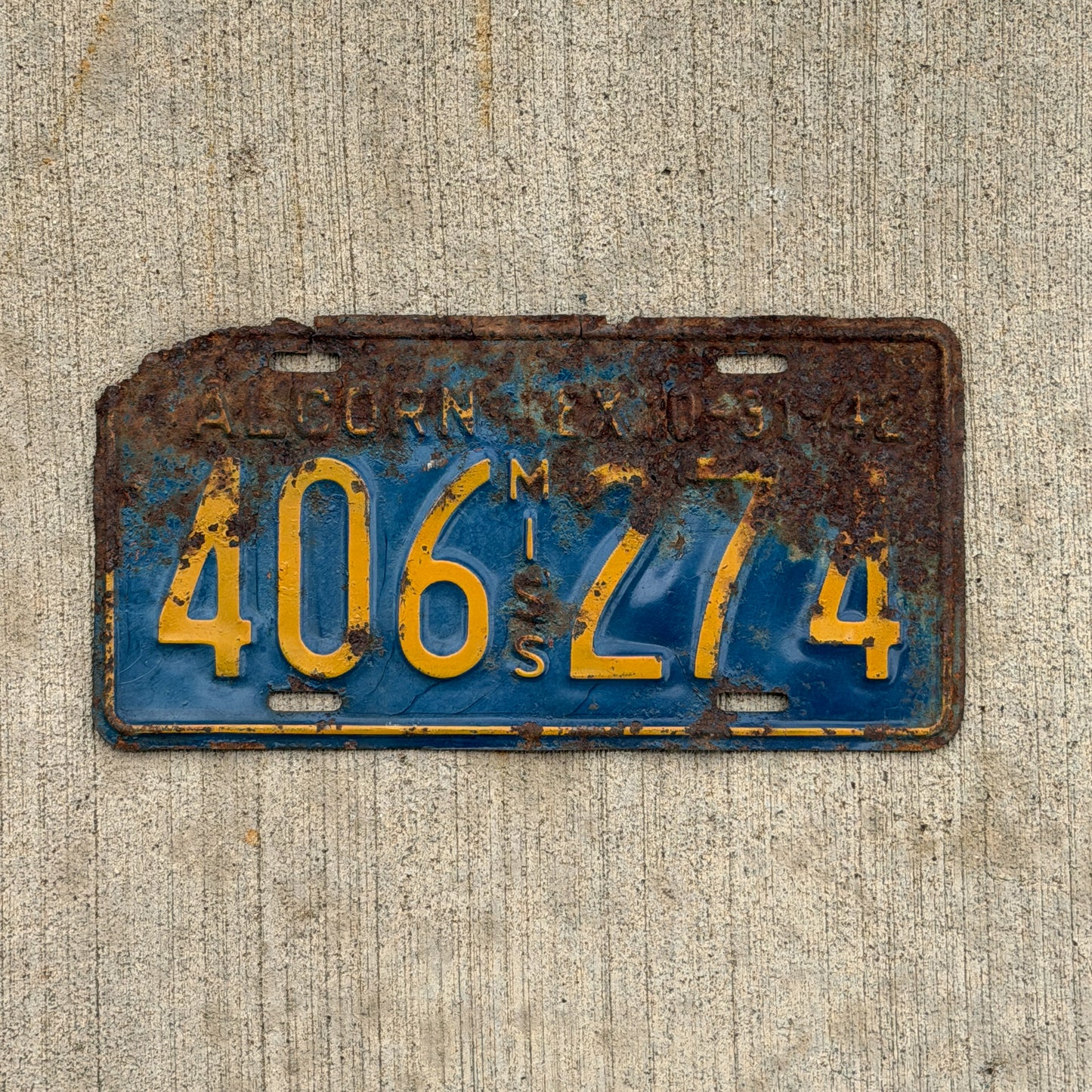 Photo of a 1942 Mississippi License Plate Auto Tag Garage Decor Vintage 406 274 with original patina