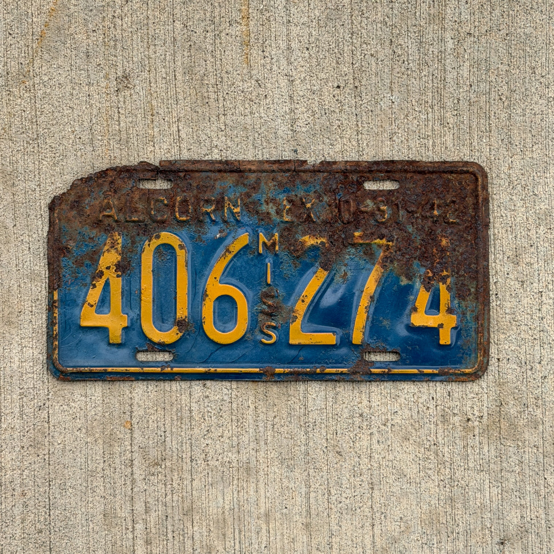 Photo of a 1942 Mississippi License Plate Auto Tag Garage Decor Vintage 406 274 with original patina