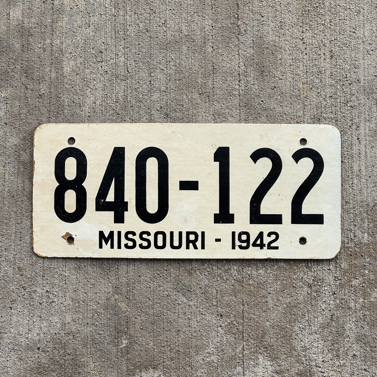 Photo of a 1942 Missouri Fiberboard License Plate Auto Tag Garage Decor Vintage High Quality 840 122 with original patina