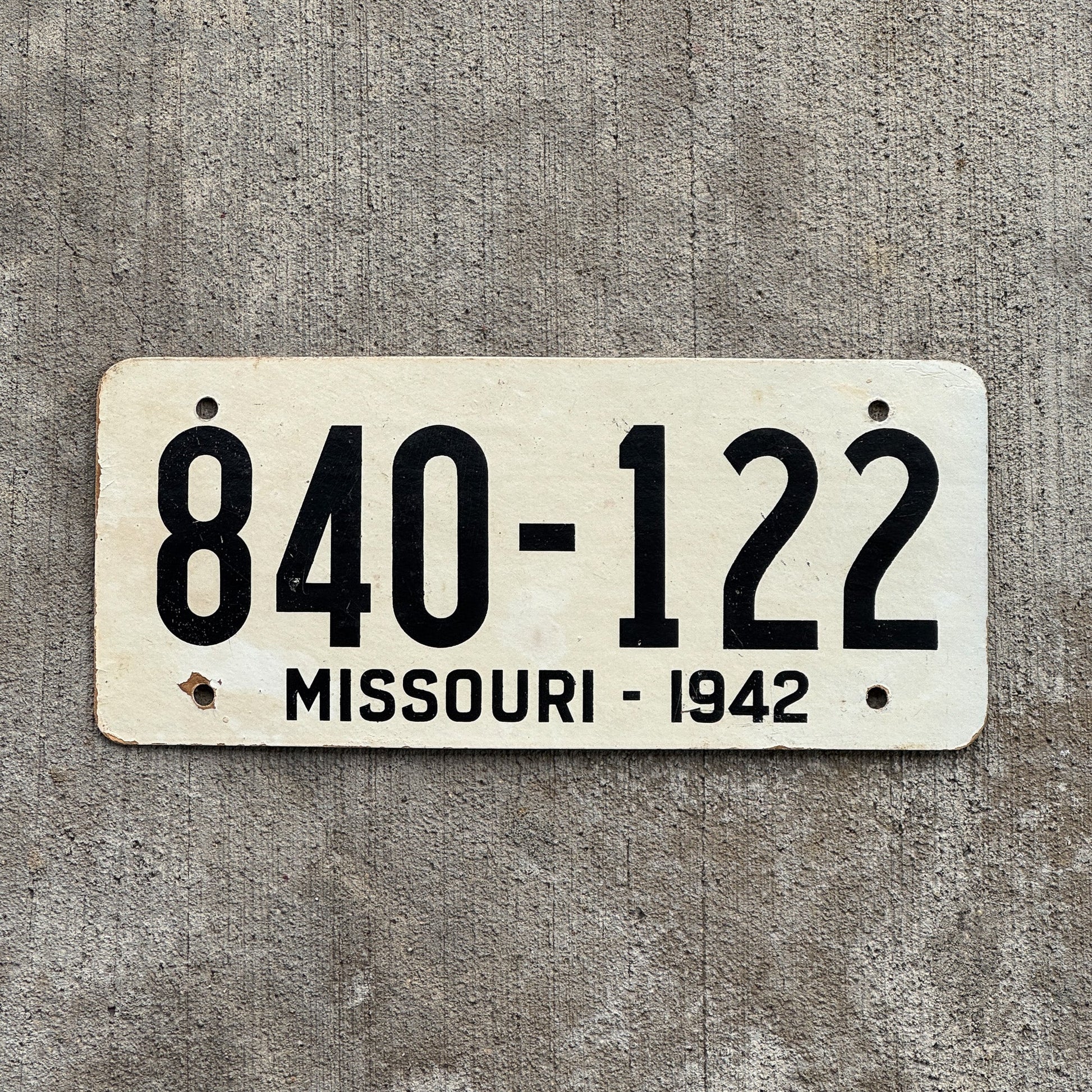 Photo of a 1942 Missouri Fiberboard License Plate Auto Tag Garage Decor Vintage High Quality 840 122 with original patina
