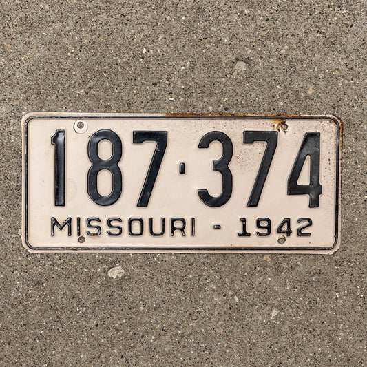 Photo of a 1942 Missouri License Plate Auto Tag Garage Decor Vintage 187 374 with original patina