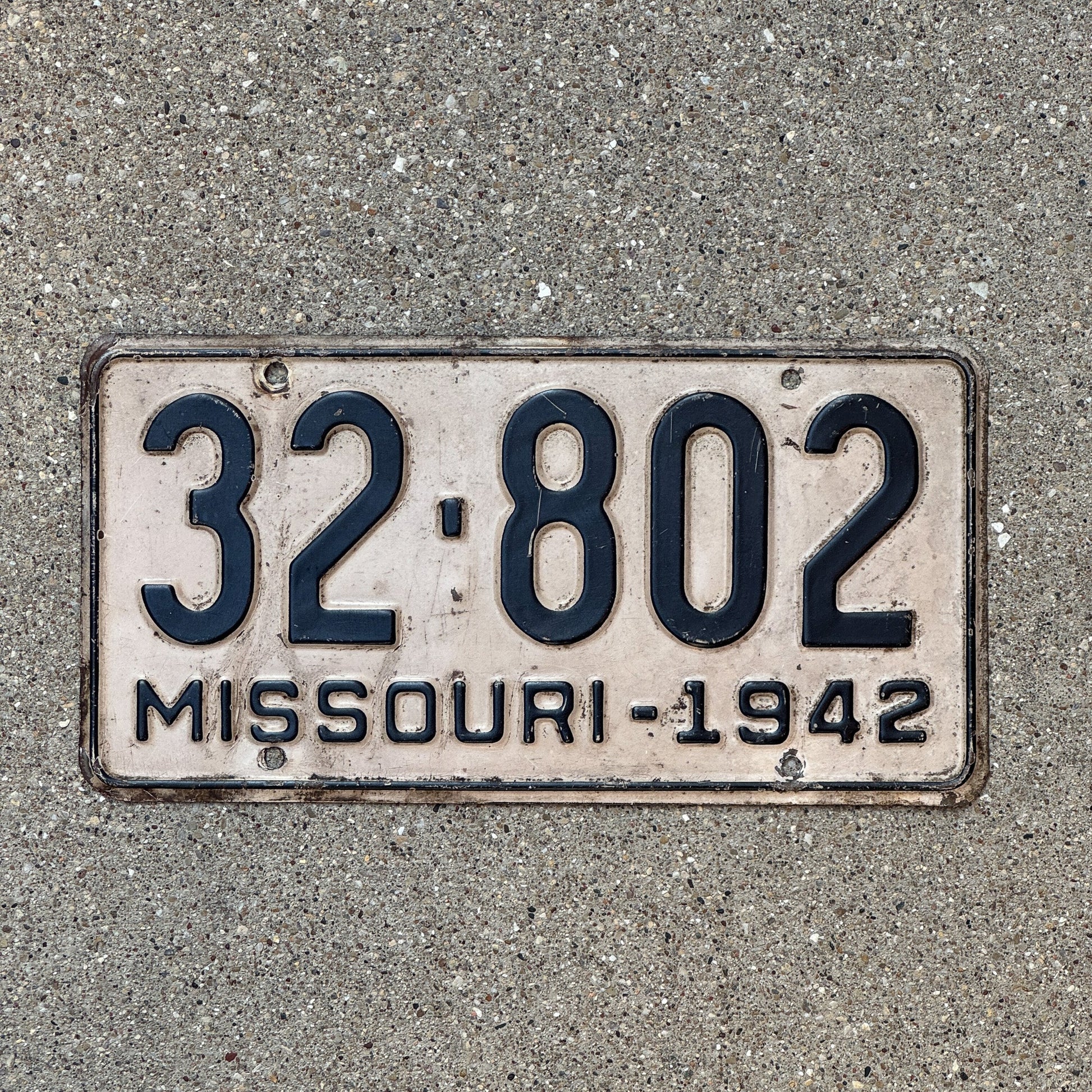 Photo of a 1942 Missouri License Plate Auto Tag Garage Decor Vintage 32 802