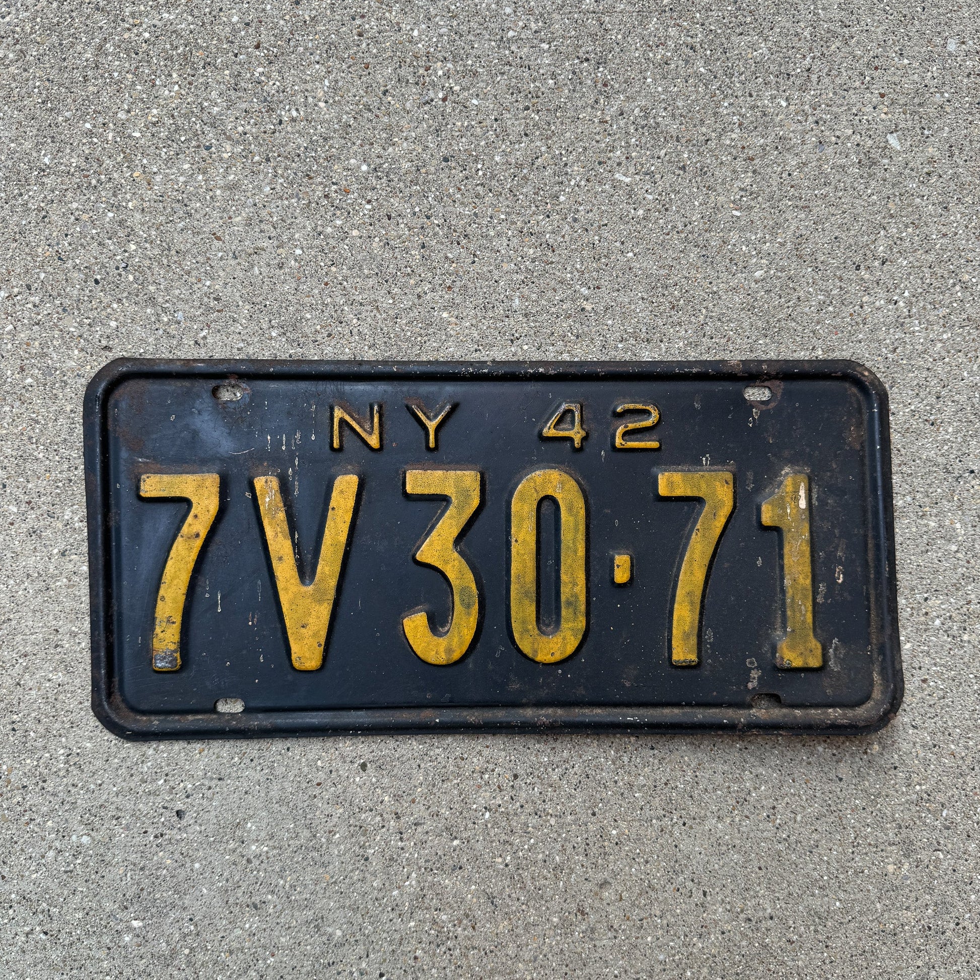 Photo of a 1942 New York License Plate Auto Tag Garage Decor Vintage Single Plate Year 7V 30 71 with original patina