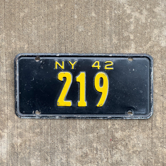 Photo of a 1942 New York Reserved License Plate Auto Tag Garage Decor Vintage Low Number Three Digit 219 with original patina