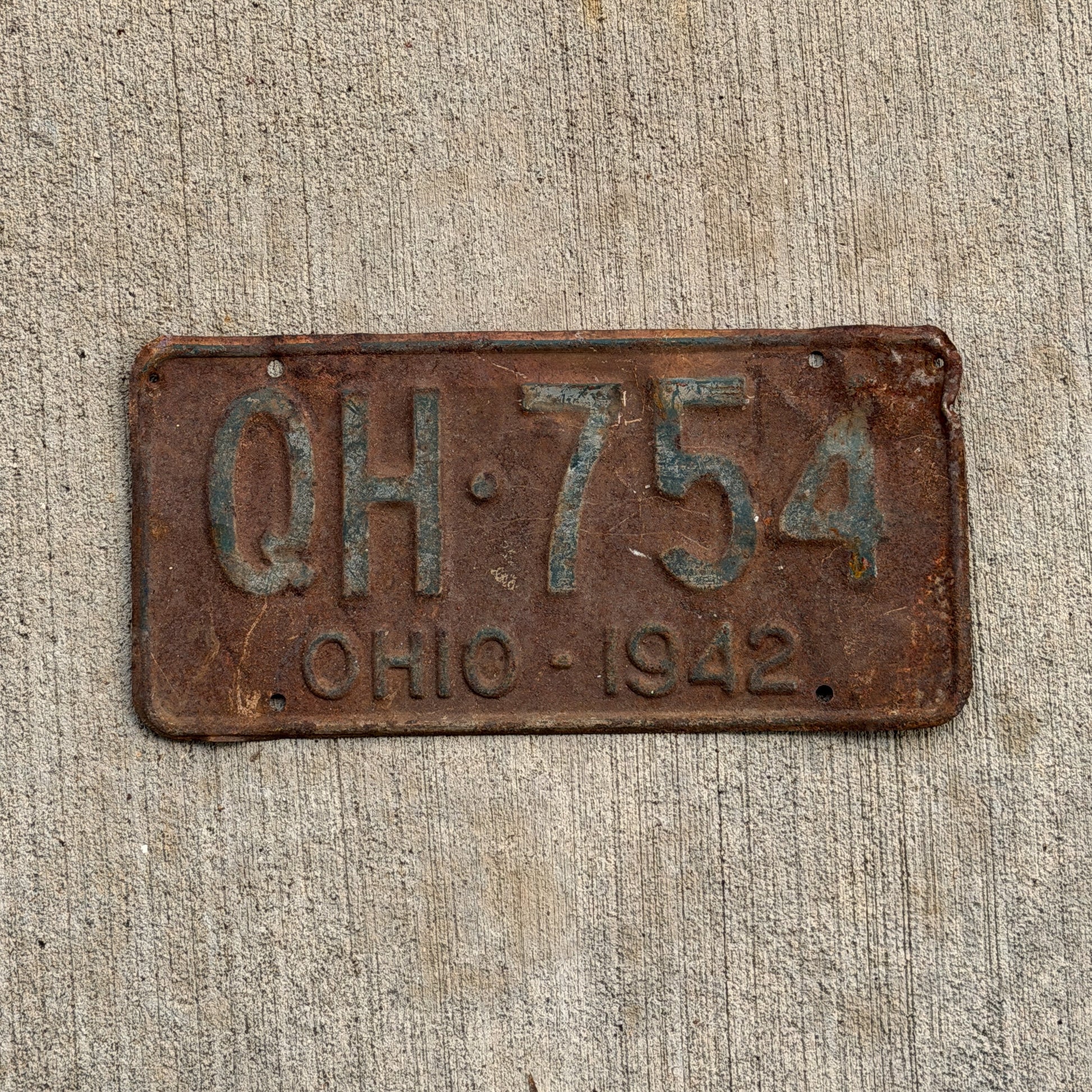 Photo of a 1942 Ohio License Plate Auto Tag Garage Decor Vintage QH 754 with original patina