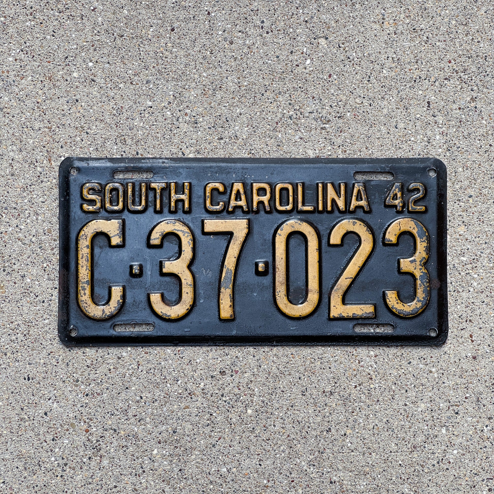 Photo of a 1942 South Carolina License Plate Auto Tag Garage Decor Vintage C 37 023 with original patina