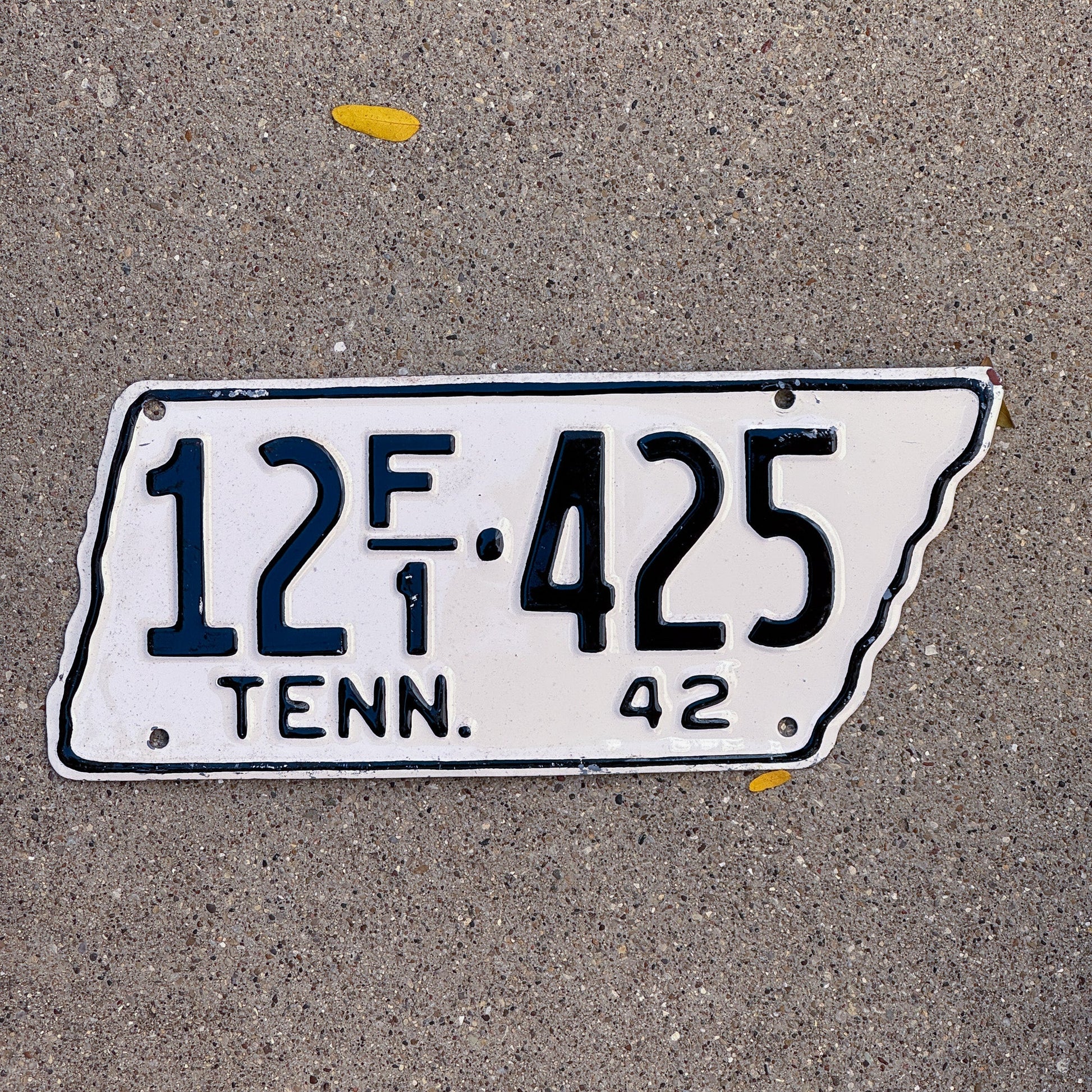 Photo of a 1942 Tennessee Farm License Plate Auto Tag Garage Decor Vintage State Shape 12 F1 425