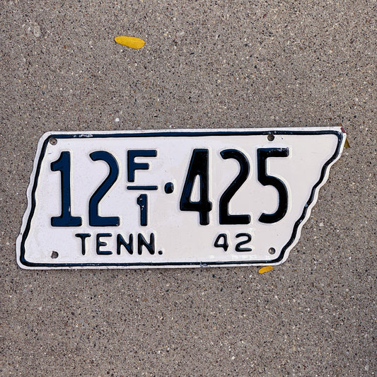 Photo of a 1942 Tennessee Farm License Plate Auto Tag Garage Decor Vintage State Shape 12 F1 425