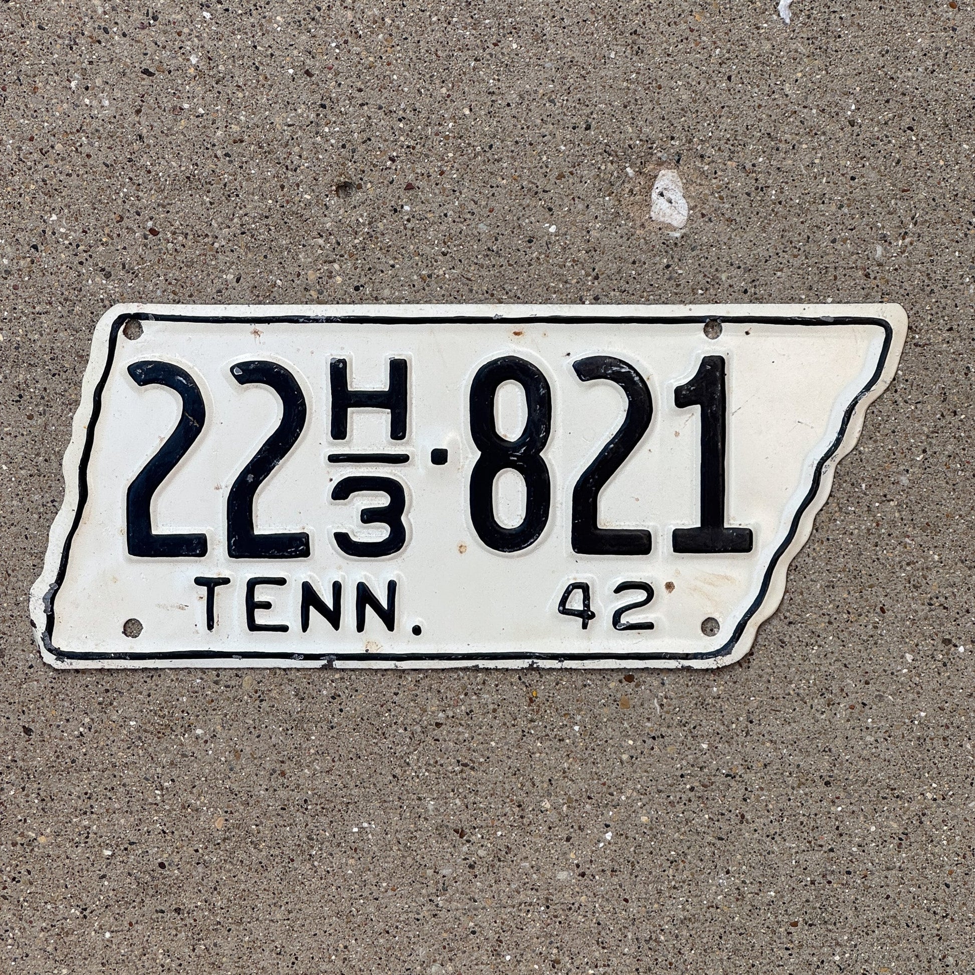 Photo of a 1942 Tennessee Truck for Hire License Plate Auto Tag Garage Decor Vintage State Shape 22 H3 821